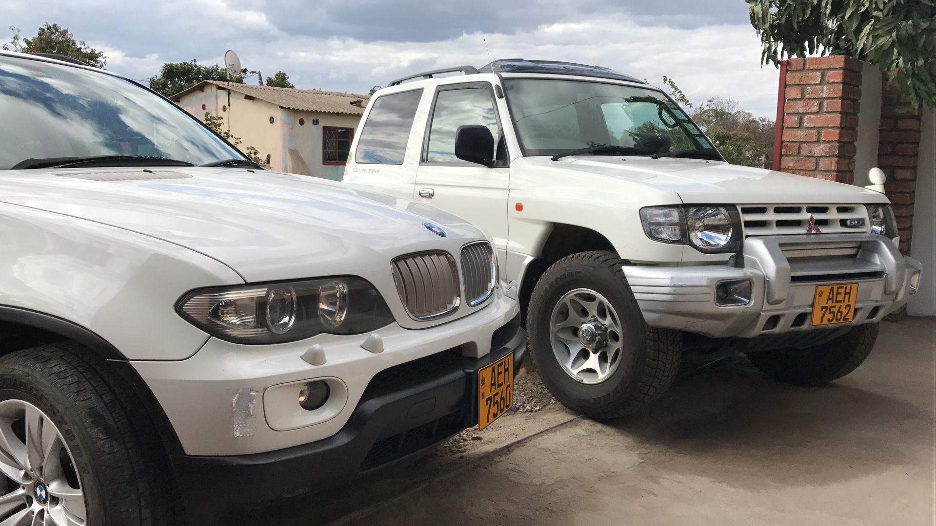 BMW X 5 and Mitsubishi. Pajero v6 23 door